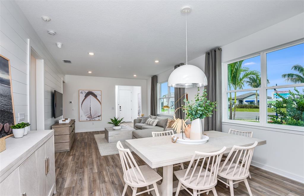1320 Orange Vly Road Minneola, FL 34715 - Photo 8 of 23 a view of a dining room with furniture window and outside view