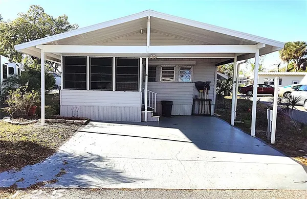 a front view of a house with glass windows