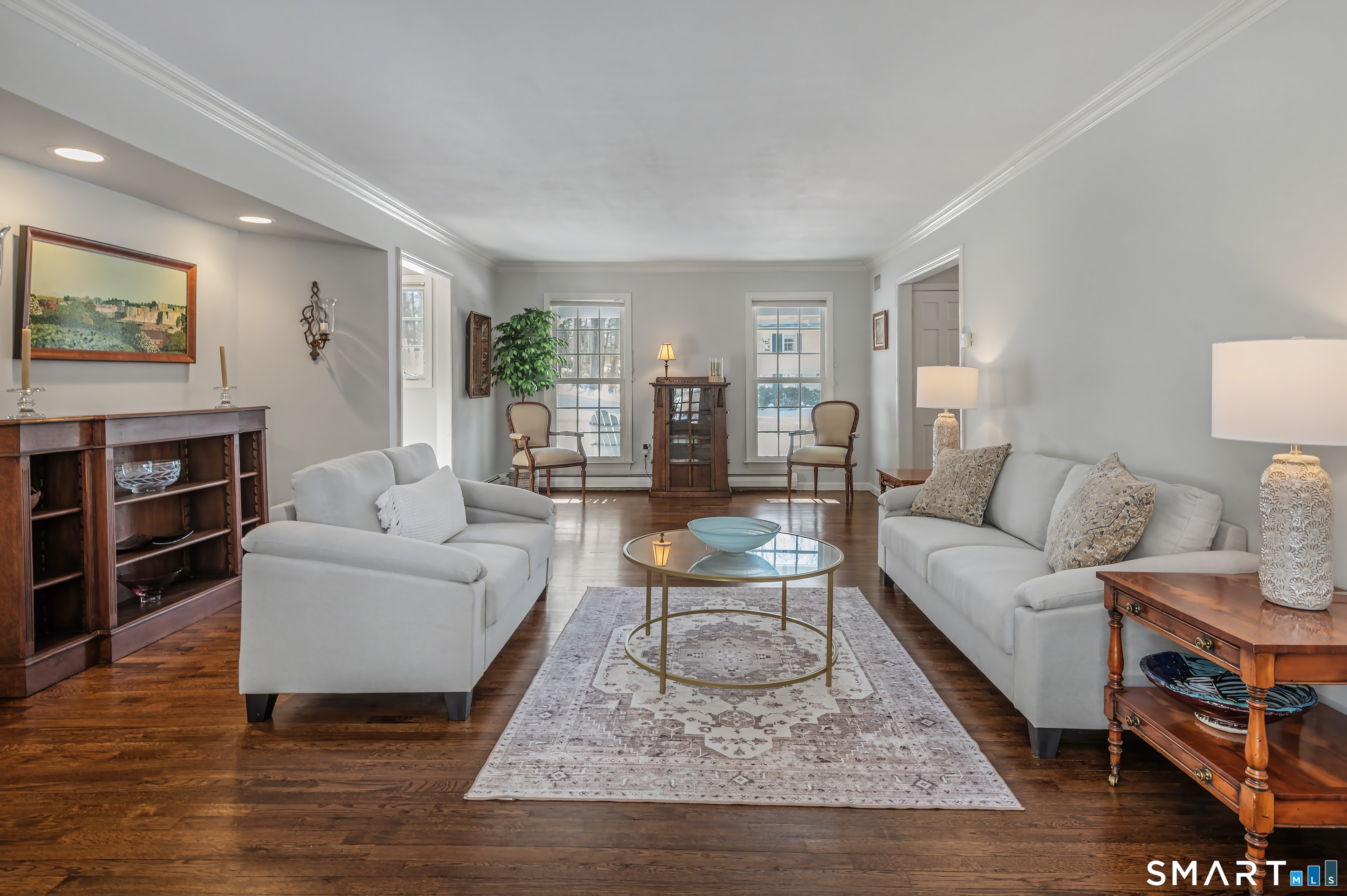 6 Sycamore Lane Ridgefield, CT 06877 - Photo 15 of 39 a living room with furniture and a wooden floor