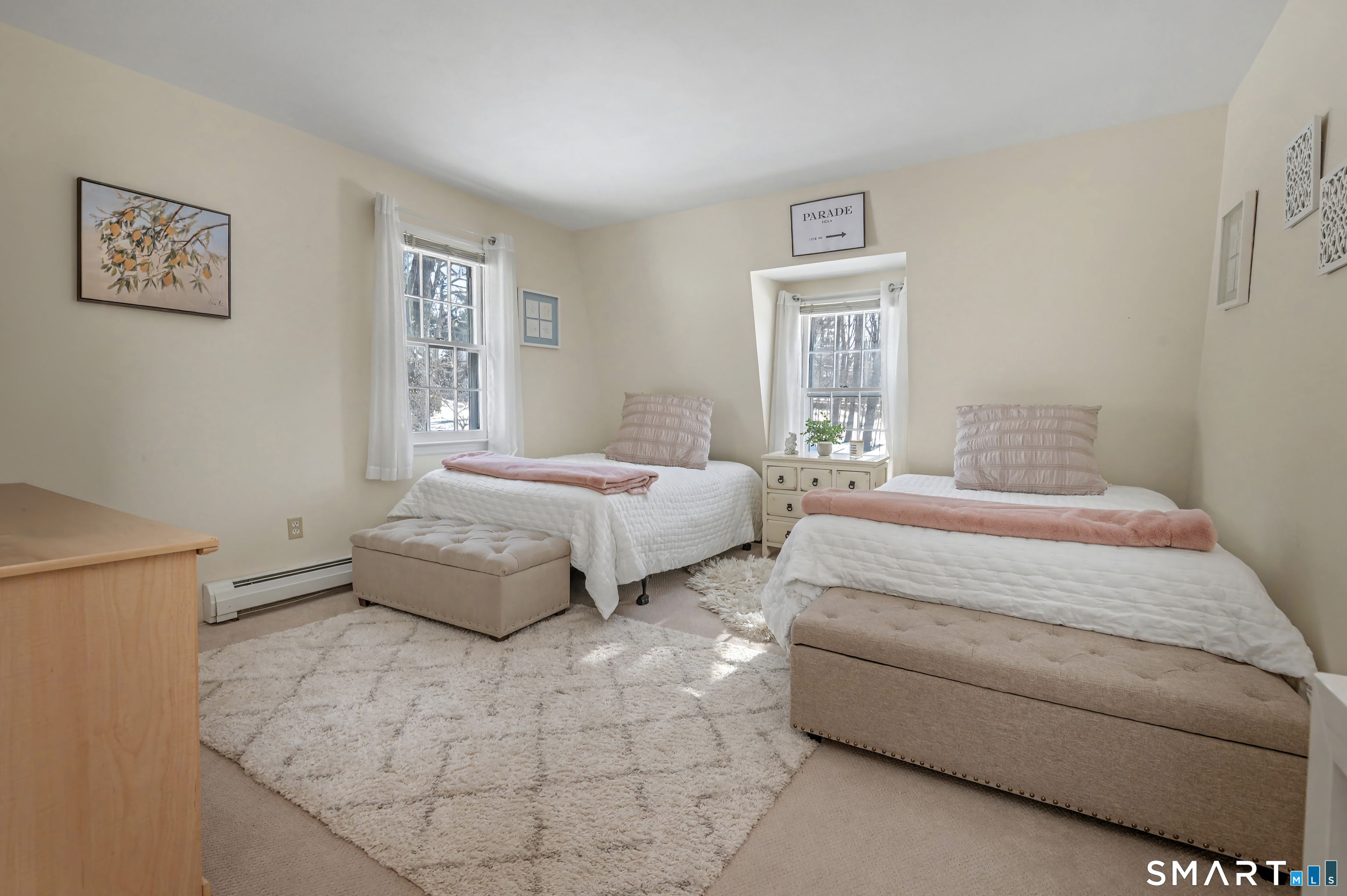 6 Sycamore Lane Ridgefield, CT 06877 - Photo 22 of 39 a bedroom with a large bed and a window