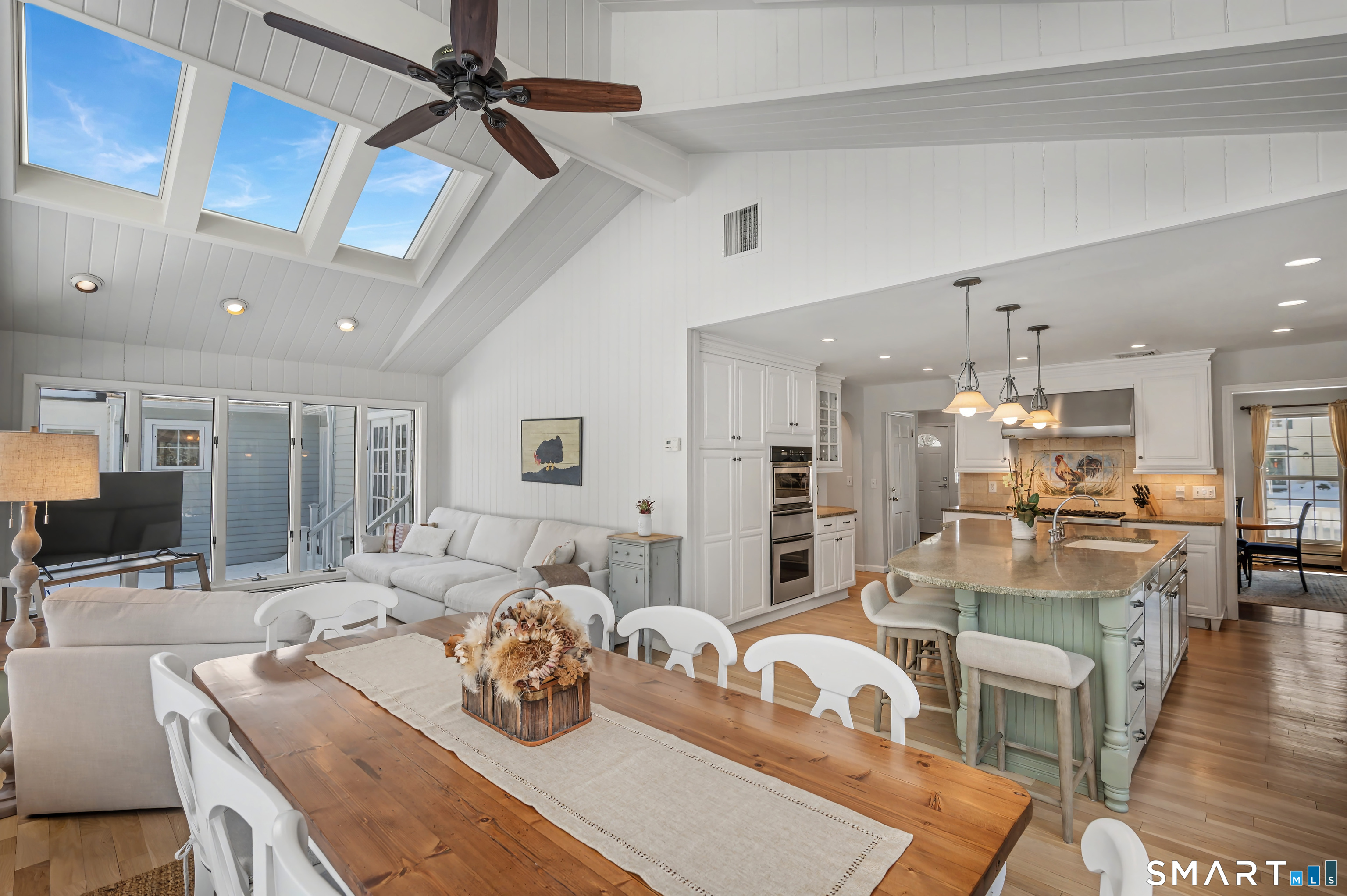6 Sycamore Lane Ridgefield, CT 06877 - Photo 5 of 39 a room with stainless steel appliances kitchen island granite countertop furniture and a view of kitchen