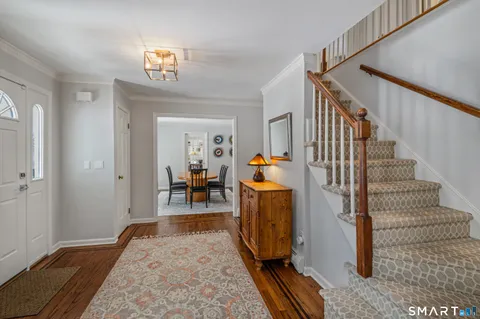 a view of livingroom with furniture and workspace