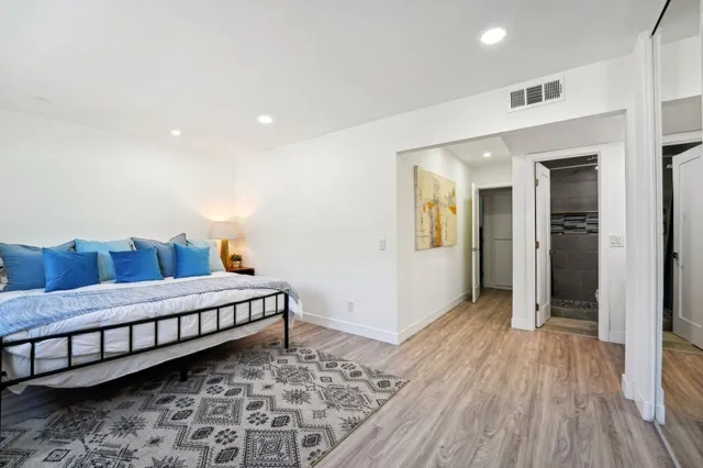 a room with furniture and wooden floor