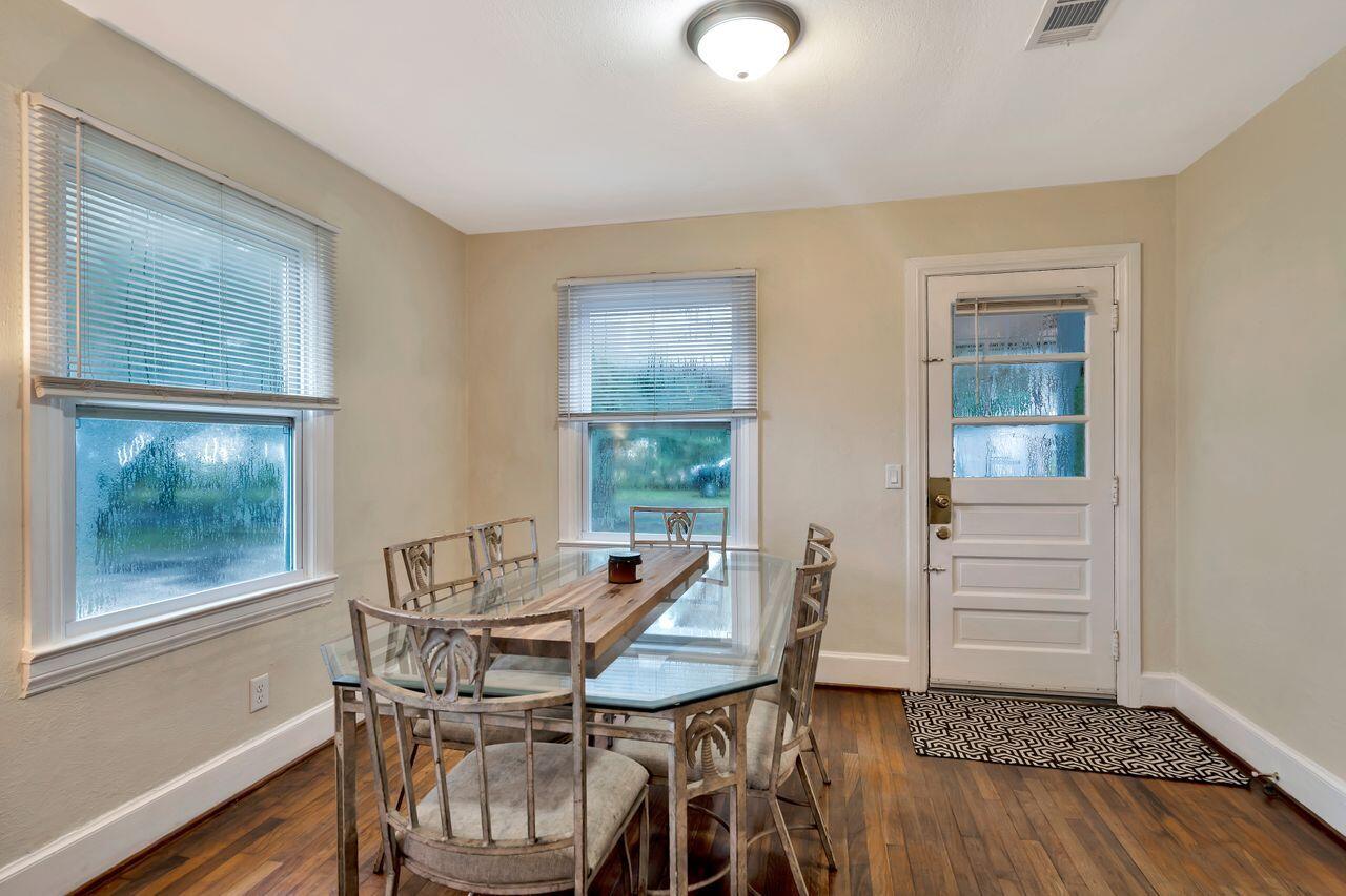 13382 Highway 20 Freeport, FL 32439 - Photo 11 of 31 a view of a dining room with furniture window and wooden floor