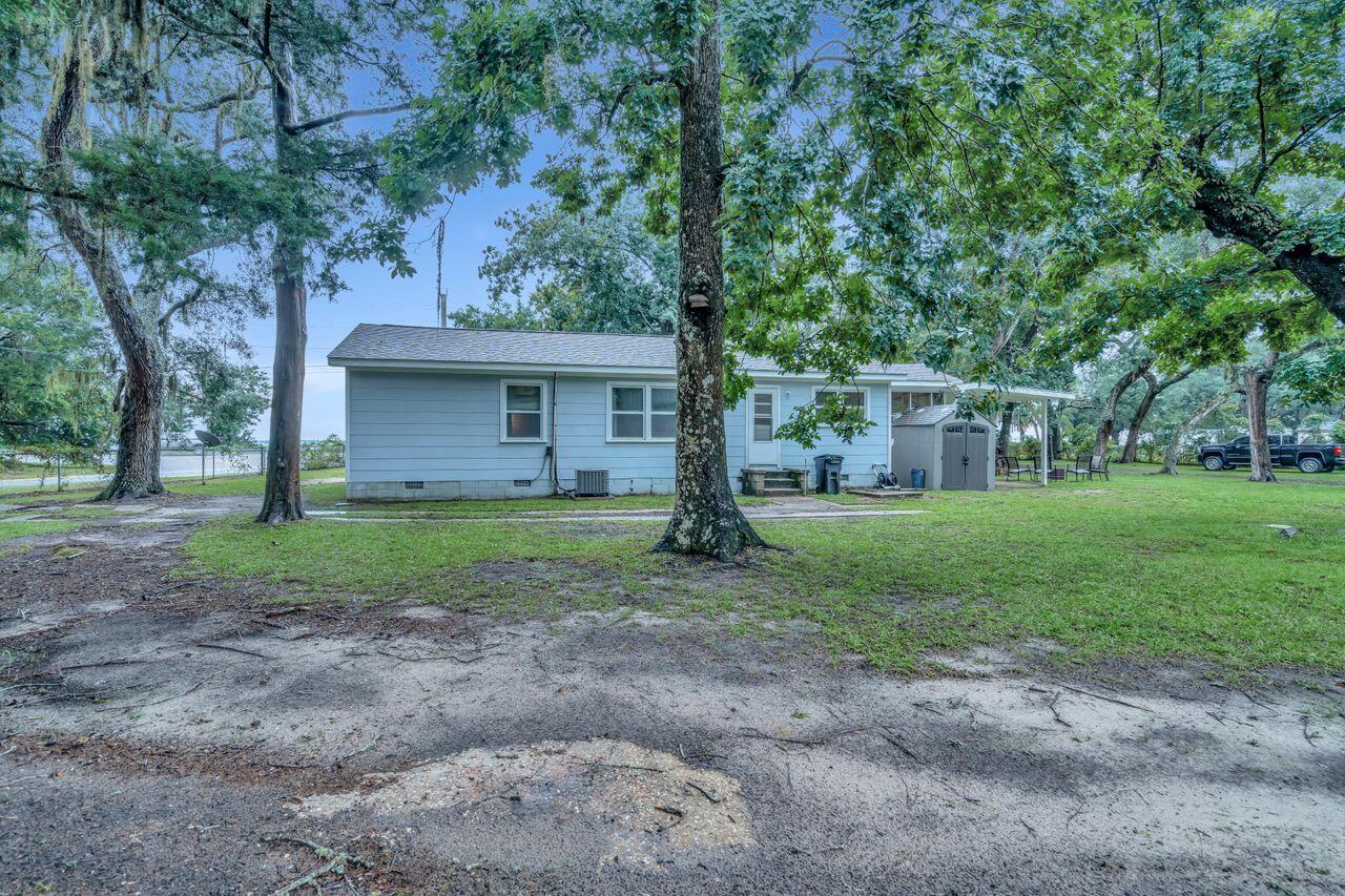 13382 Highway 20 Freeport, FL 32439 - Photo 31 of 31 a view of a house with yard and tree s