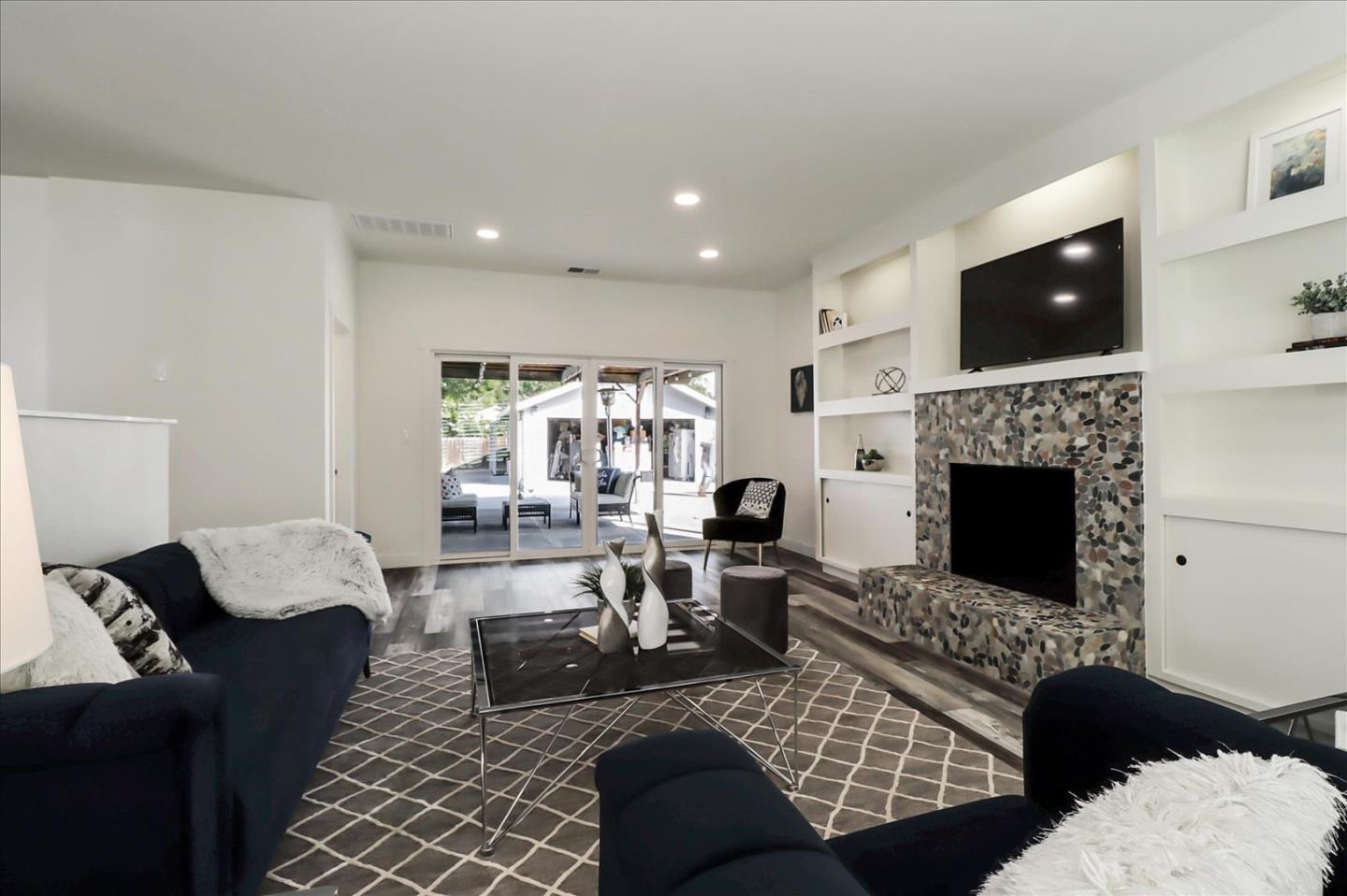 280 Dallas Drive Campbell, CA 95008 - Photo 11 of 64 a living room with furniture rug and fireplace