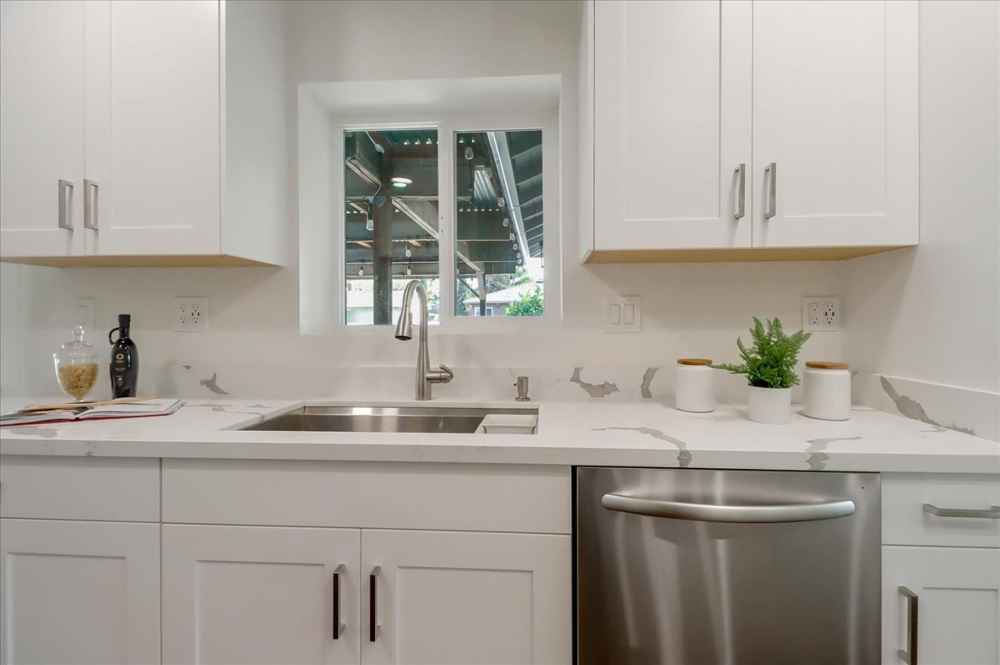 280 Dallas Drive Campbell, CA 95008 - Photo 15 of 64 a kitchen with a sink and cabinets