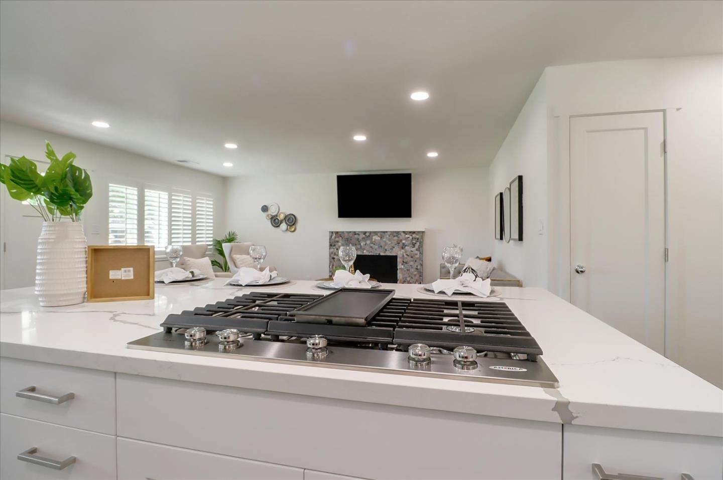 280 Dallas Drive Campbell, CA 95008 - Photo 16 of 64 a living room with furniture a fireplace and a flat screen tv