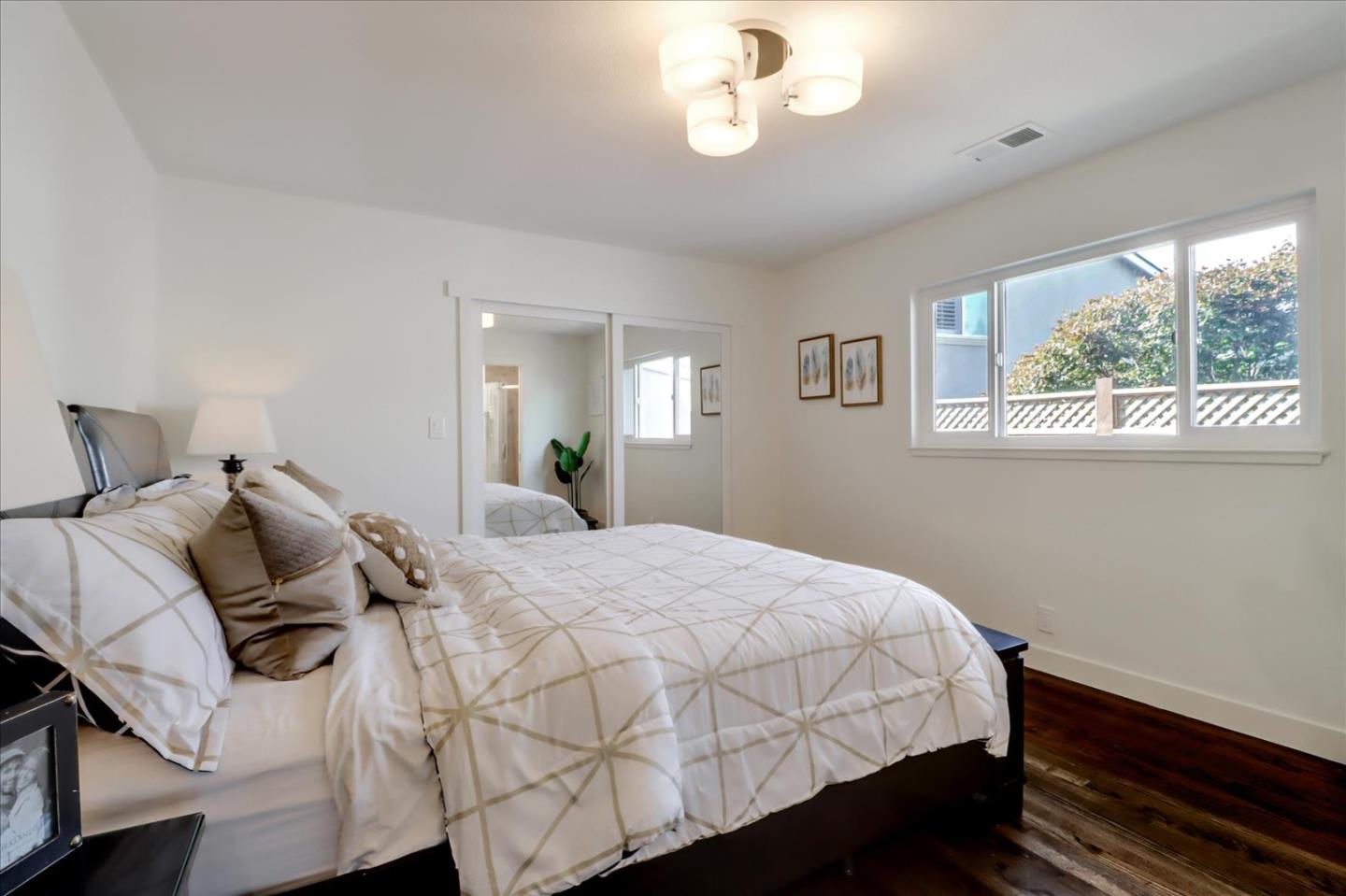 280 Dallas Drive Campbell, CA 95008 - Photo 29 of 64 a bedroom with a bed and wooden floor