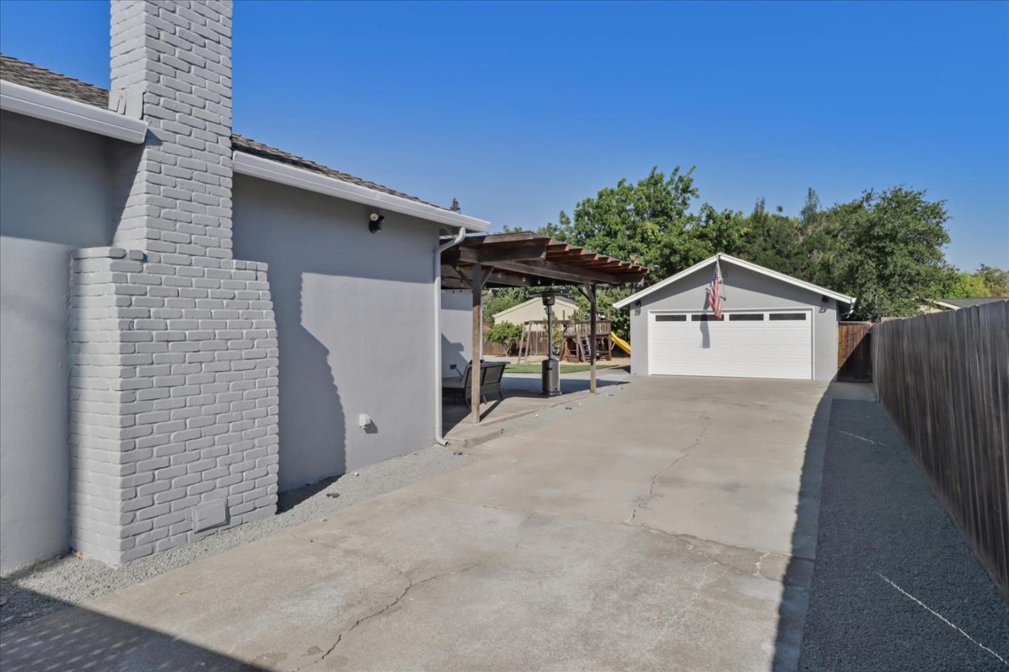 280 Dallas Drive Campbell, CA 95008 - Photo 37 of 64 a front view of a house with a yard and garage