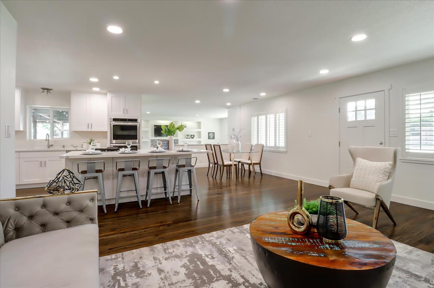 280 Dallas Drive Campbell, CA 95008 - Photo 6 of 64 a living room with fireplace furniture and a dining table with wooden floor