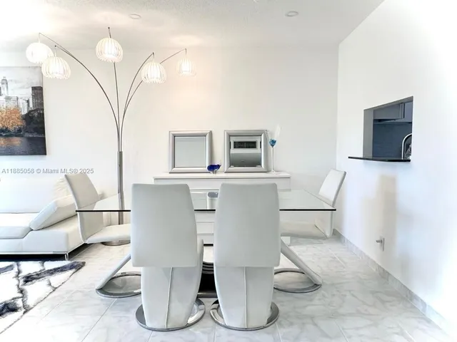 a living room with a couch and a flat screen tv