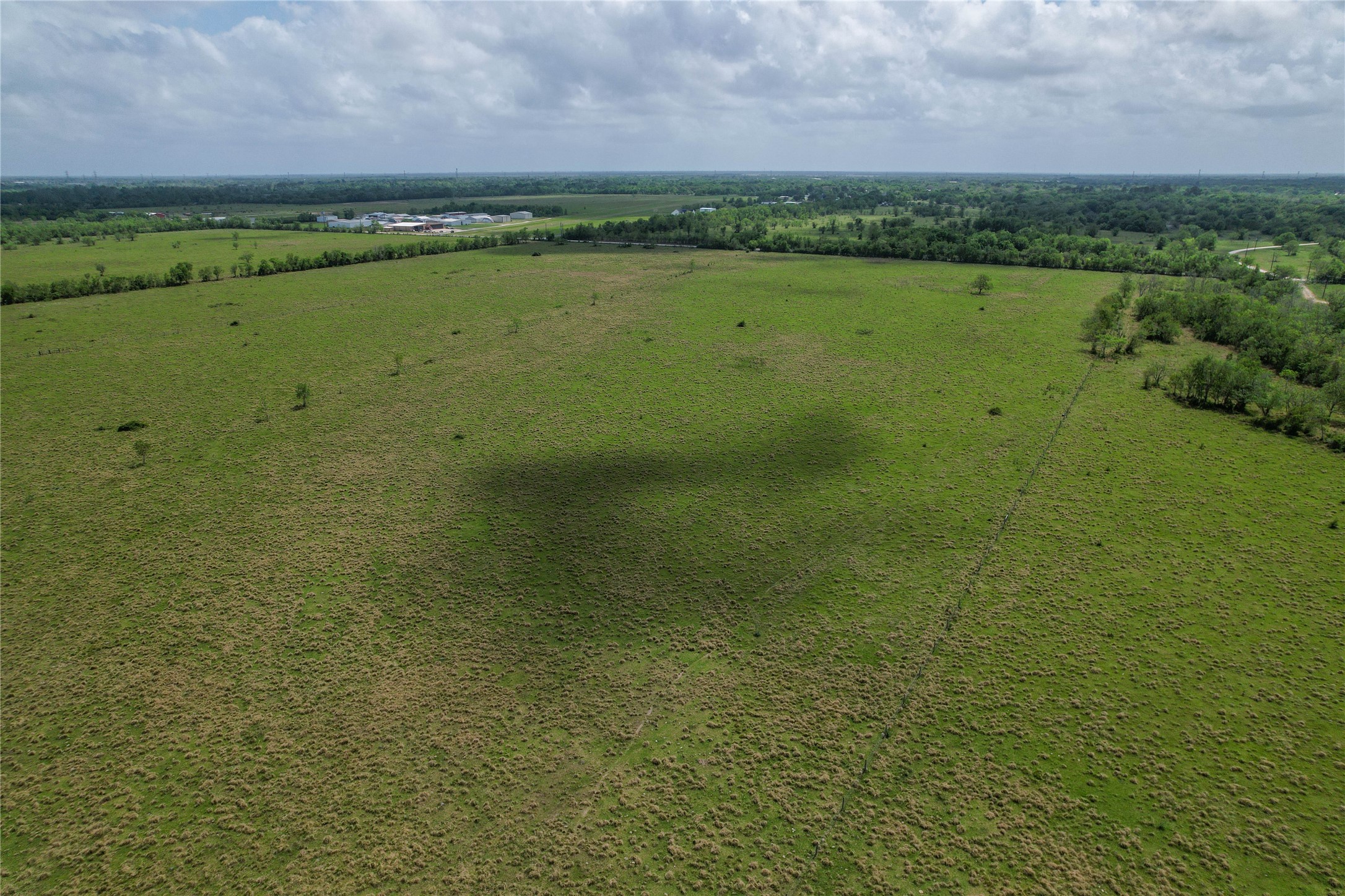 0 County Road 98 Manvel, TX 77578 - Photo 5 of 8 a view of a lake with a yard