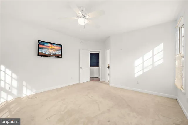 a view of a lake with a building in background