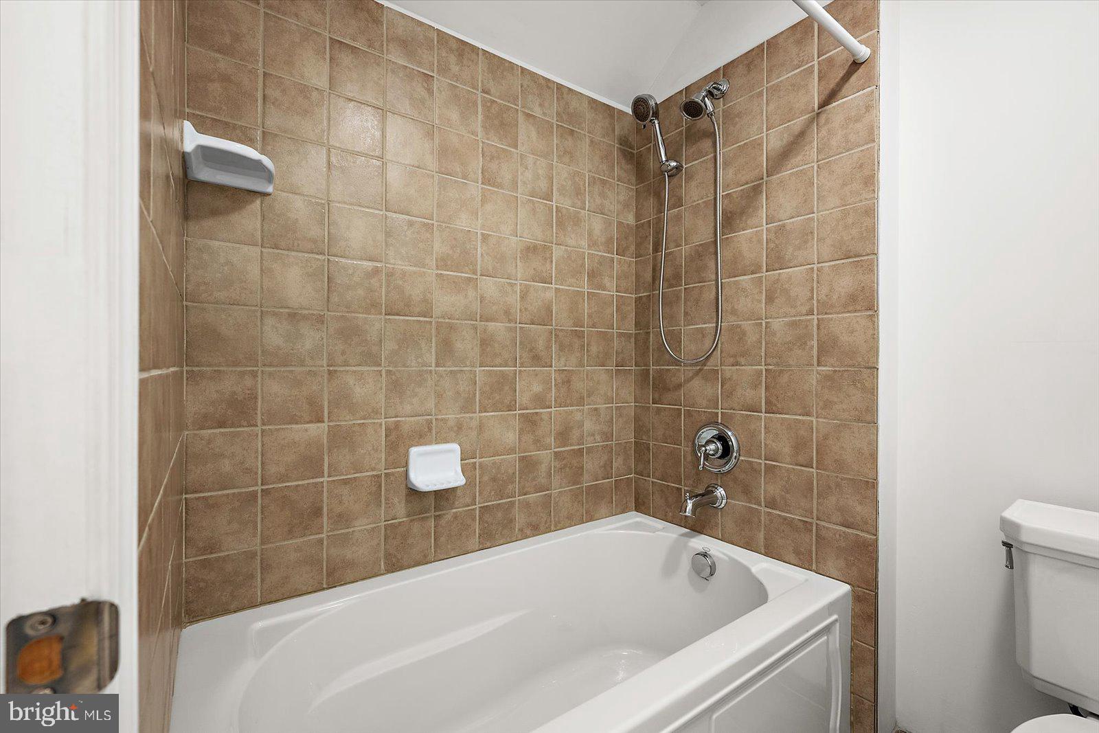 101 Mumford Landing Road Ocean Pines, MD 21811 - Photo 71 of 135 tub, tiled walls upper level #3 bathroom