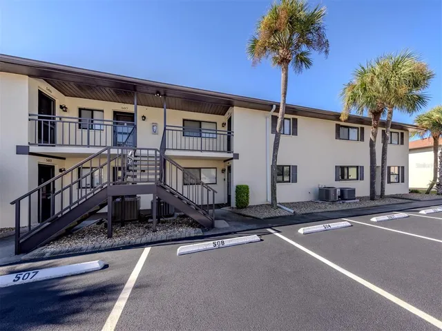 a front view of a house with a yard and porch