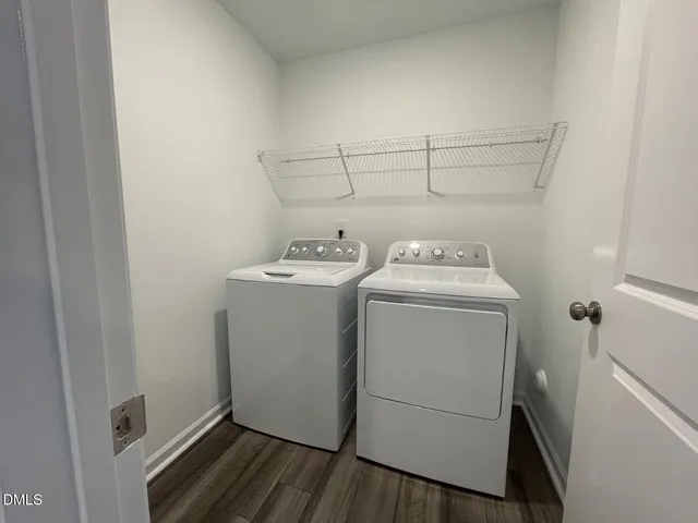 a bathroom with a sink a toilet a shower and a mirror