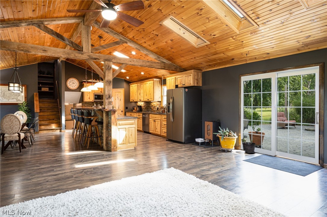 7996 Buffham Road Lodi, OH 44254 - Photo 26 of 40 Vaulted wood-paneled ceilings with exposed beams and skylights