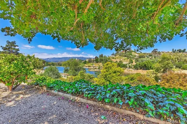 a view of a lake with a building in the background