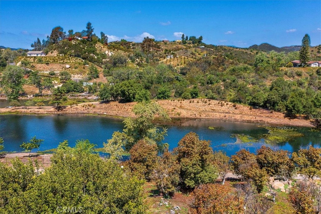 40057 South Shore Drive Fallbrook, CA 92028 - Photo 52 of 53 a view of a lake with mountains in the background