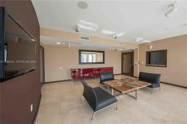 a view of a patio with couches table and chairs