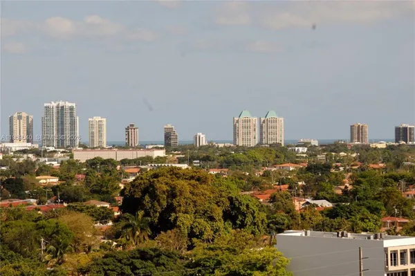 a view of a city with tall buildings