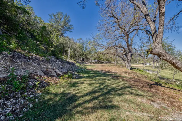 a view of balcony with wooden floor