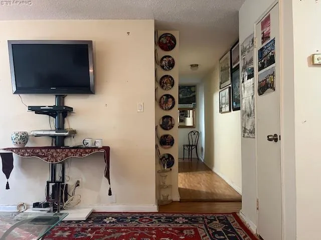 a kitchen with stainless steel appliances a stove and a refrigerator