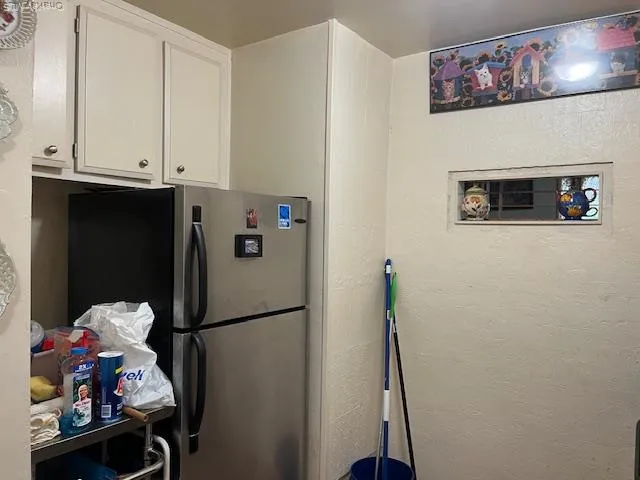 a view of a workspace with furniture