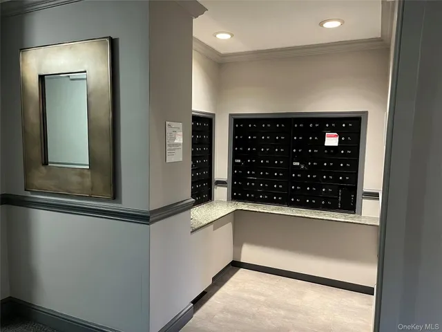 view of wooden floor and windows in a room