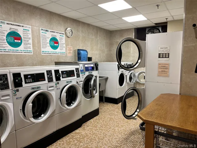 a utility room with dryer and washer