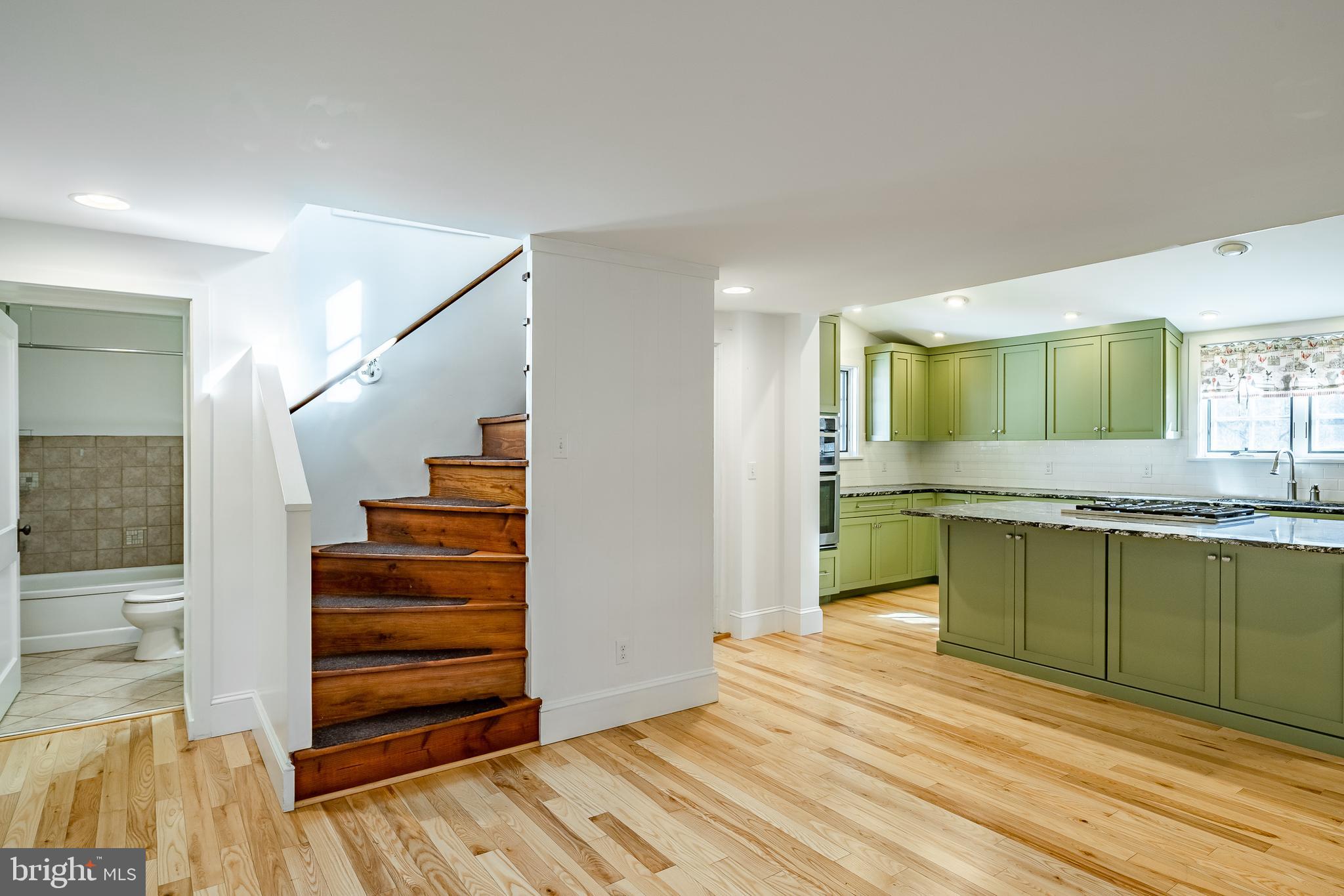 768 Forgedale Road Barto, PA 19504 - Photo 13 of 49 a view of a kitchen with sink and dishwasher wooden floor