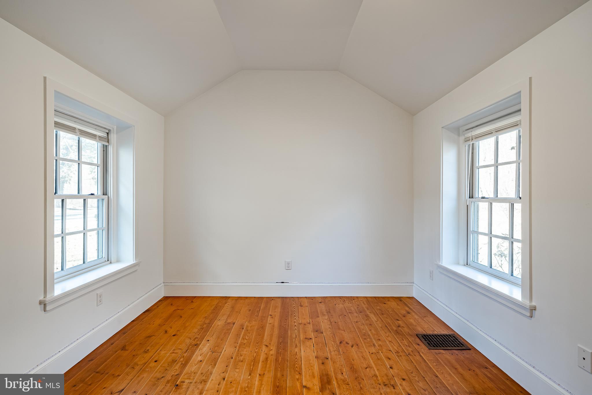 768 Forgedale Road Barto, PA 19504 - Photo 37 of 49 an empty room with wooden floor and windows