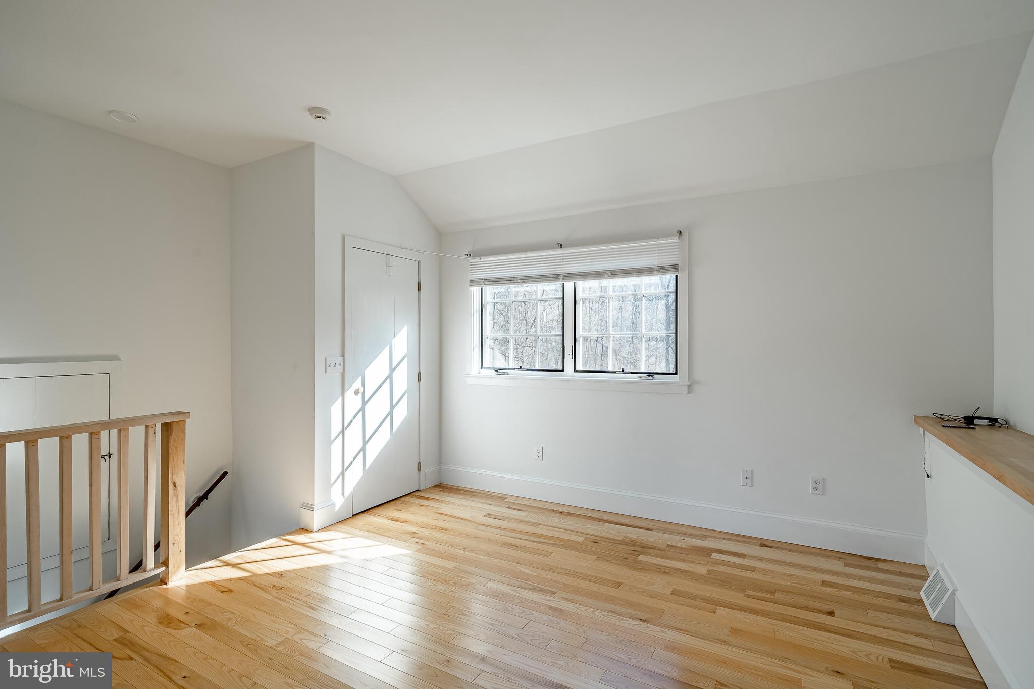 768 Forgedale Road Barto, PA 19504 - Photo 39 of 49 a view of empty room with wooden floor and fan
