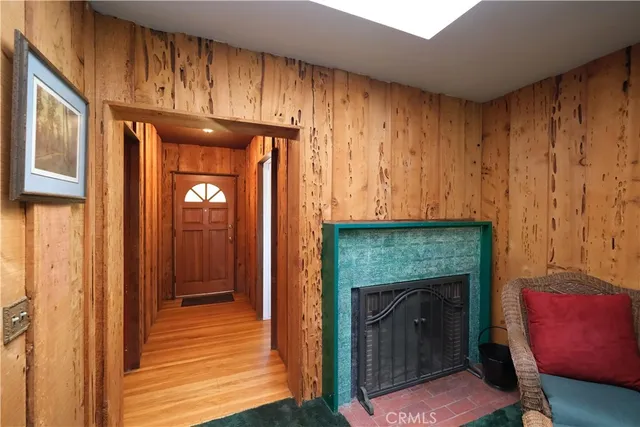 a view of a livingroom with furniture and a fireplace