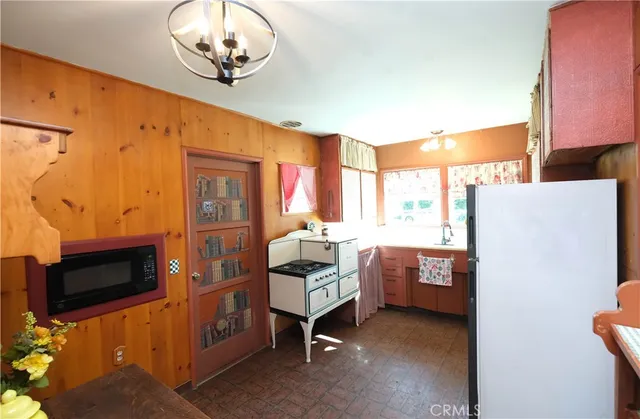 a room with furniture and a flat screen tv