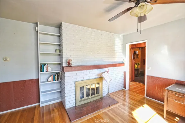 a room with furniture and a wooden floor