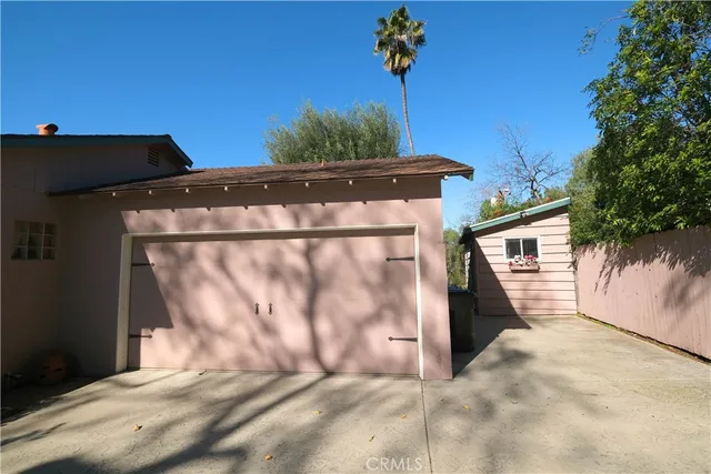 a view of a house with a garage