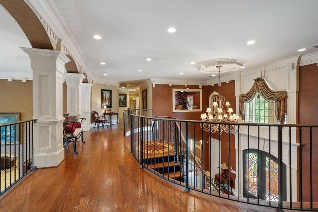 a bathroom with a sink mirror and a shower