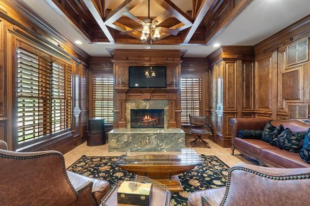 a view of a chairs and table in a patio