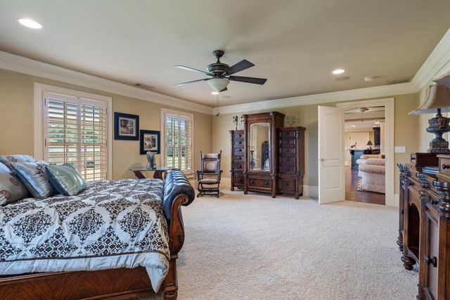 a view of a lake with a yard