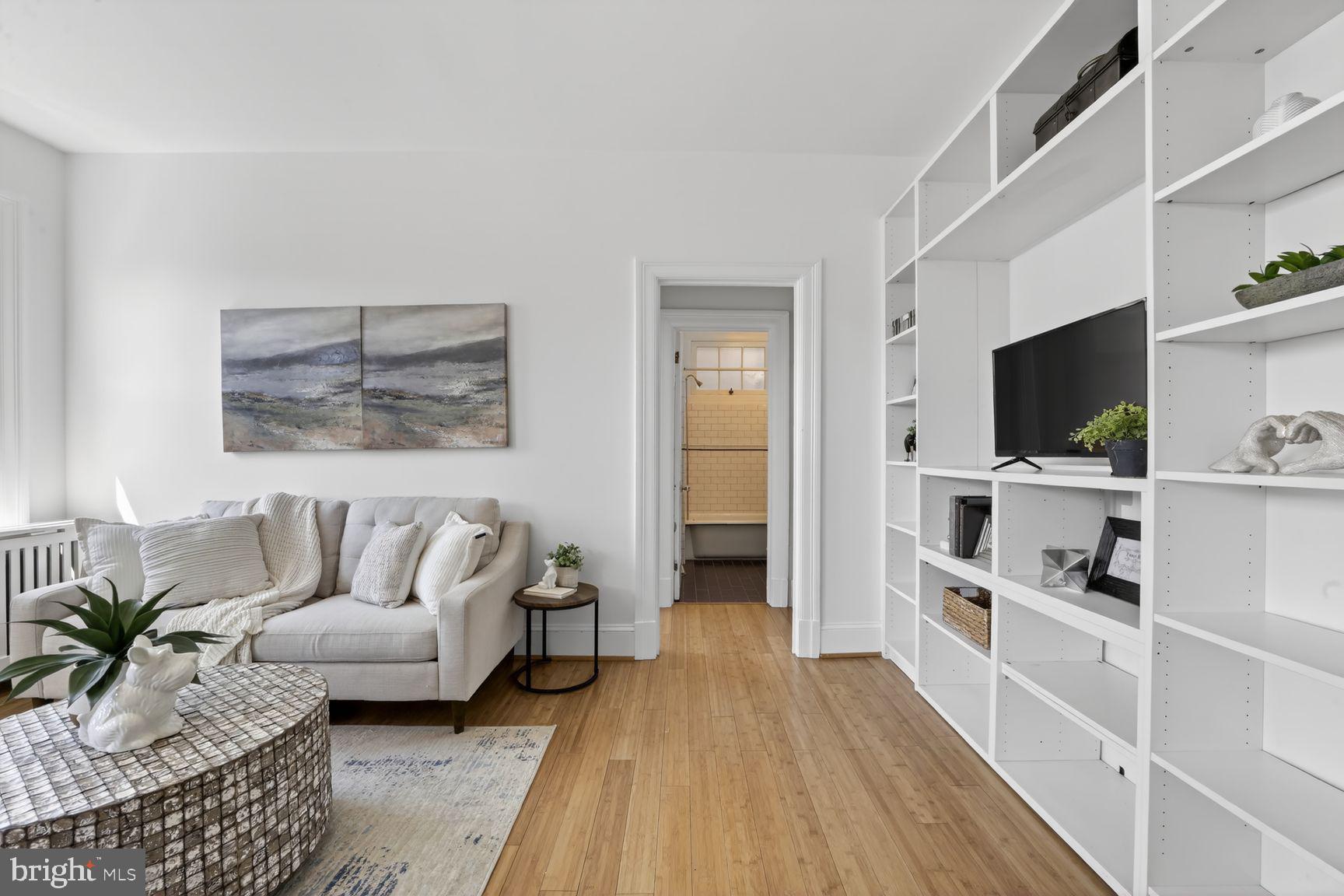 2707 Adams Mill Road Northwest, Unit 400 Washington, DC 20009 - Photo 6 of 21 Bright and airy living space oasis.