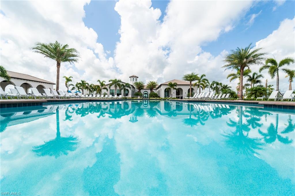 5174 Julienne Road Immokalee, FL 34142 - Photo 3 of 16 Community pool with a patio area