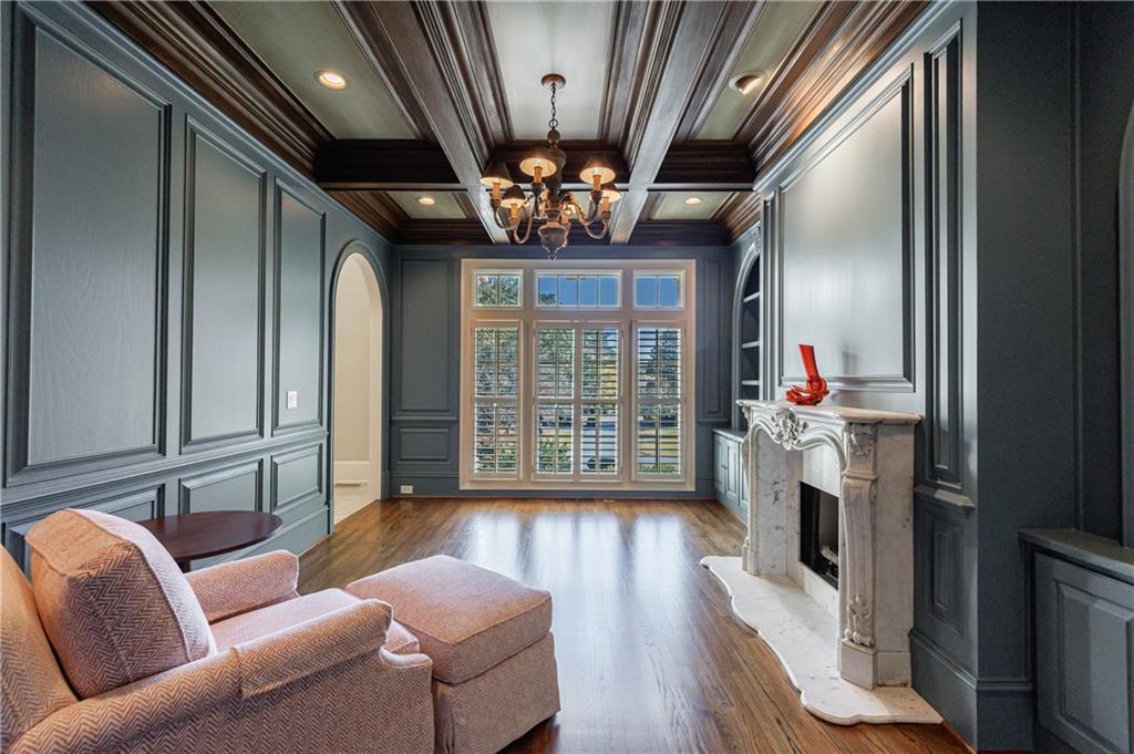 9390 Colonnade Trail Alpharetta, GA 30022 - Photo 11 of 122 a living room with furniture fireplace and flat screen tv