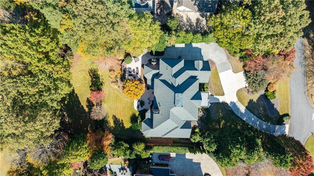 9390 Colonnade Trail Alpharetta, GA 30022 - Photo 112 of 122 an aerial view of a house with a yard and garden
