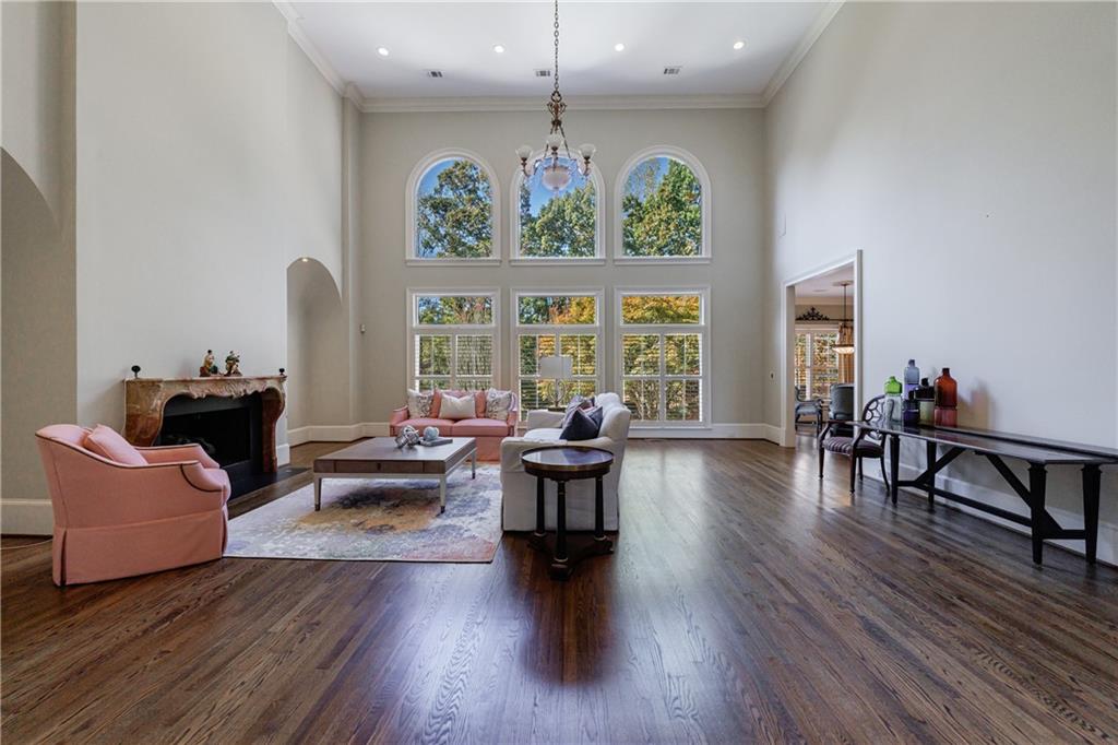 9390 Colonnade Trail Alpharetta, GA 30022 - Photo 12 of 122 a living room with furniture and a large window
