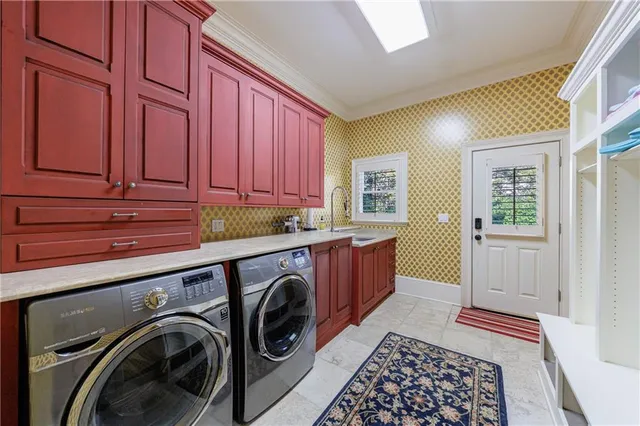 a view of a hallway with wooden floor and entryway