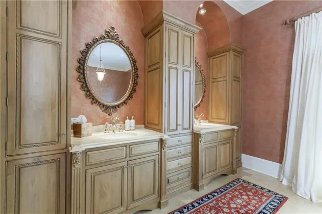 a bedroom with a bed and a cabinets