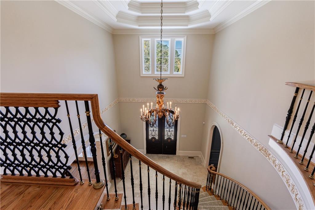9390 Colonnade Trail Alpharetta, GA 30022 - Photo 48 of 122 a view of entryway with wooden floor