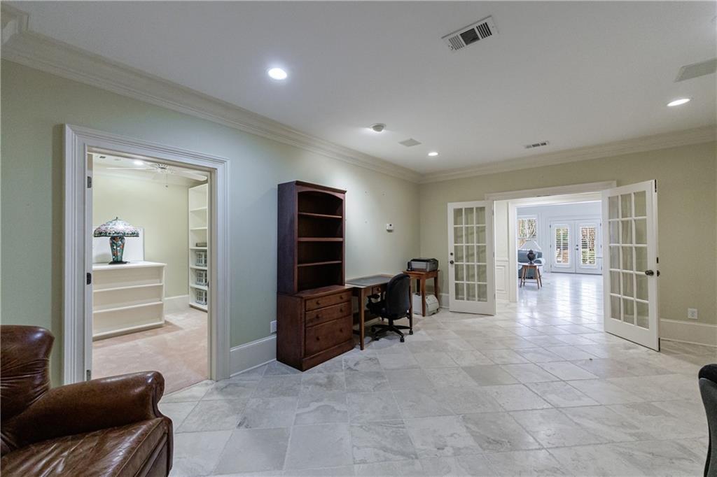 9390 Colonnade Trail Alpharetta, GA 30022 - Photo 82 of 122 a living room with furniture and a walk in closet